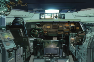 戦車の運転席を描いたイラスト。中央にはハンドルと多数のモニターや制御装置が配置されており、運転席の座席が前面に見える。壁にはさまざまなボタンとスイッチが備えられている。